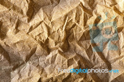 Gold Crumpled Glitter Shiny Paper Background Stock Photo