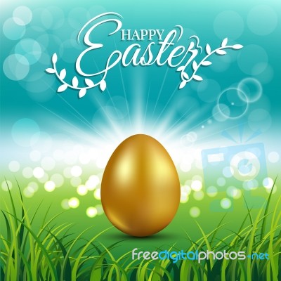 Gold Egg On Fresh Spring Grass For Easter Day Greeting Card Stock Image