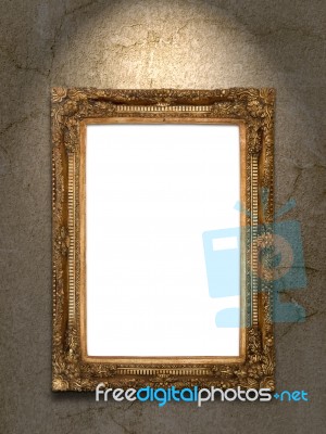 Gold Vintage Photo Frame On Grunge Wall Stock Photo