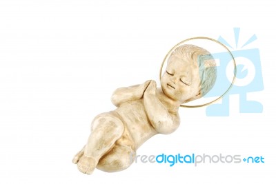 Golden Baby Jesus Lying On White Stock Photo