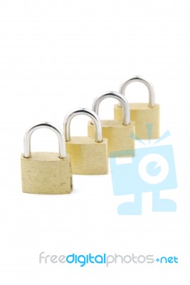 Golden Closed Padlocks On White Stock Photo