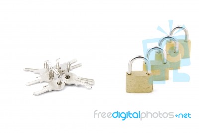 Golden Closed Padlocks With Keys On White Stock Photo