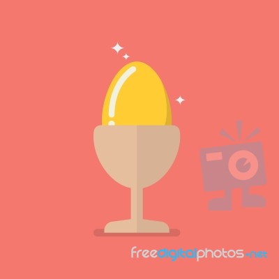 Golden Egg In Eggcup Stock Image