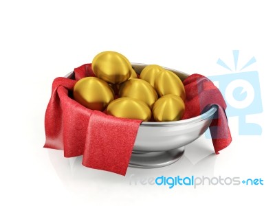 Golden Eggs In Silver Bowl Stock Image