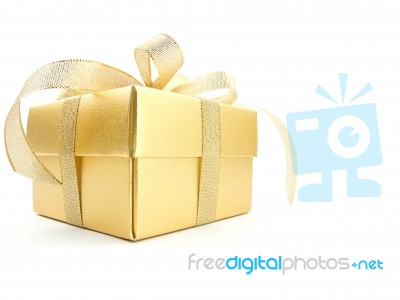 Golden Gift Box With Golden Ribbon Stock Photo