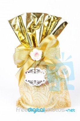 Golden Gift Sack Of Tea Cup Stock Photo