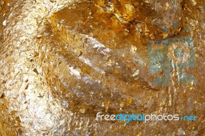 Golden Gilded Buddha Face Stock Photo