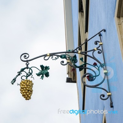 Golden Grapes Hanging Sign In Rothenburg Stock Photo