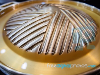 Golden Grilling Pan Stock Photo