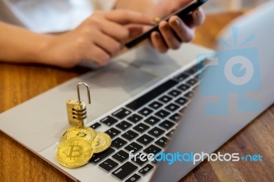 Golden Metal Bitcoin Crypto Currency Investment- Symbolic Block Stock Photo