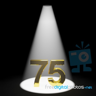 Golden Number Of 75 With Spotlit Stock Image