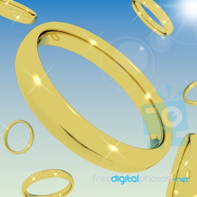 Golden Rings Falling From Sky Stock Image