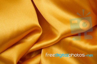 Golden Satin Background Stock Photo