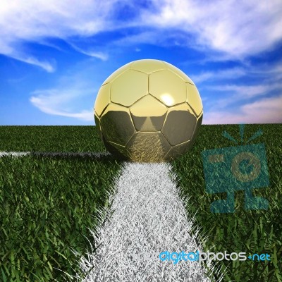 Golden Soccer Ball In Grass Stock Image