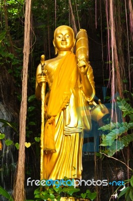 Golden Standing Buddha Statue Stock Photo