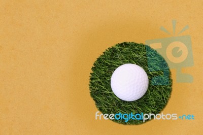 Golf Ball Edge Of Grass Field And Sand Stock Photo