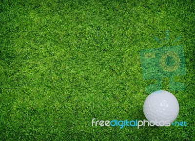 Golf Ball On Green Grass Stock Photo