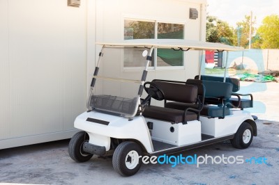 Golf Car With Backseat On Location Stock Photo