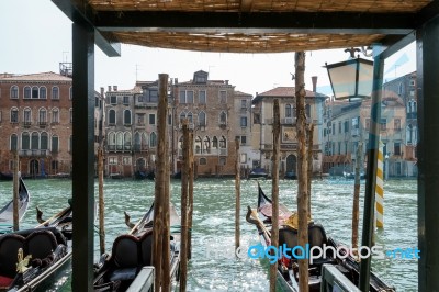 Gondolas Moored Along A Canal In Venice Stock Photo