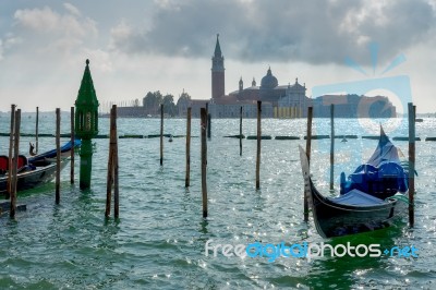 Gondolas Moored At The Entrance To The Grand Canal Stock Photo