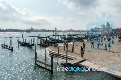 Gondolas Moored At The Entrance To The Grand Canal Stock Photo