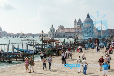 Gondolas Moored At The Entrance To The Grand Canal Stock Photo