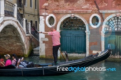 Gondolier Plying His Trade Stock Photo