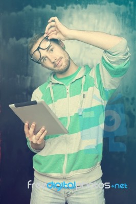 Good Looking Smart Nerd Man With Tablet Computer Stock Photo