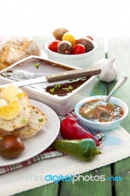 Goose Liver And Sauternes Pate With Peppers, Tomatoes, Sliced Br… Stock Photo