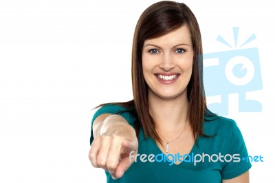 Gorgeous Female Pointing Towards The Camera Stock Photo