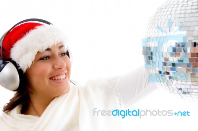 Gorgeous Girl With Christmas Hat And Wearing Headphones Stock Photo