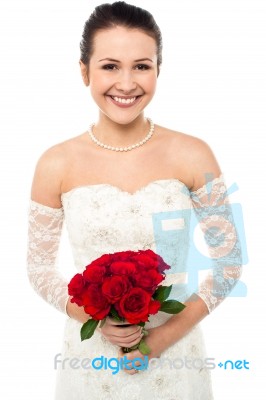 Gorgeous Pretty Bride With A Rose Bouquet Stock Photo