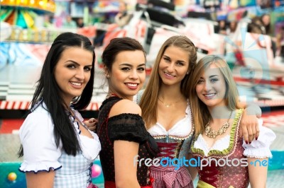 Gorgeous Young Women At German Funfair Stock Photo