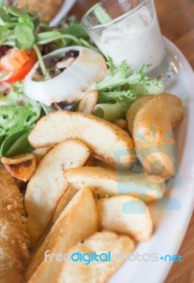 Gourmet Fish And Chips With Salad Stock Photo