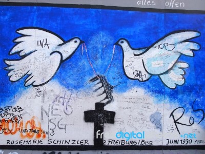 Graffiti On Berlin Wall At East Side Gallery In Berlin Stock Photo