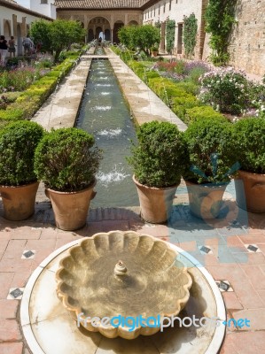 Granada, Andalucia/spain - May 7 : View Of A Fountain In The Alh… Stock Photo