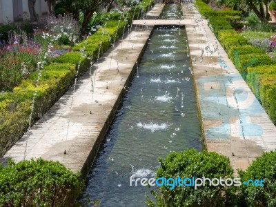 Granada, Andalucia/spain - May 7 : View Of A Fountain In The Alh… Stock Photo