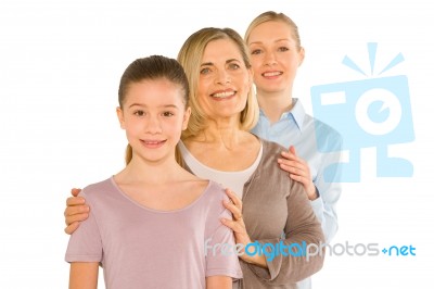 Granddaughter Grandmother Young Mother Standing On White Backgro… Stock Photo