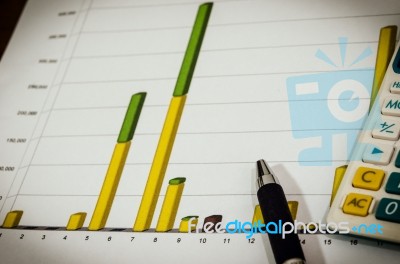 Graphs And Pen Stock Photo