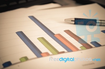 Graphs And Pen Stock Photo