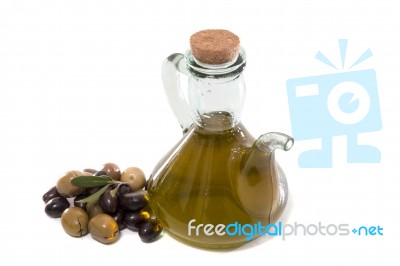 Green And Black Olives With Olive Oil Bottle Stock Photo