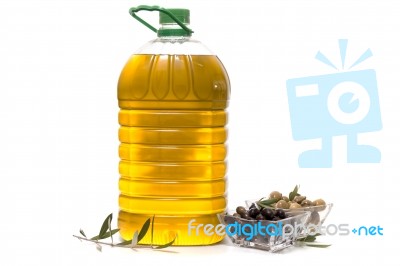 Green And Black Olives With Olive Oil Bottle Stock Photo