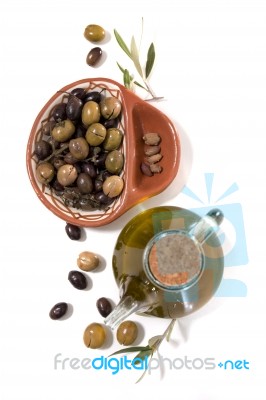 Green And Black Olives With Olive Oil Bottle Stock Photo