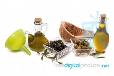 Green And Black Olives With Olive Oil Bottles Stock Photo