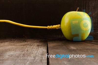 Green Apple Connected To A Data Network Stock Photo