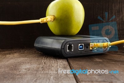 Green Apple Connected To A Data Network Stock Photo