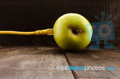 Green Apple Connected To A Data Network Stock Photo