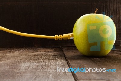 Green Apple Connected To A Data Network Stock Photo