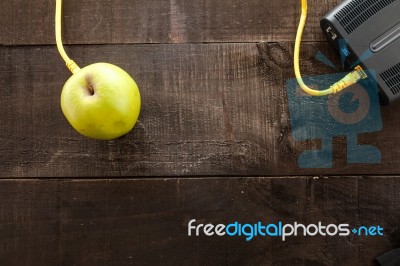 Green Apple Connected To A Data Network Stock Photo