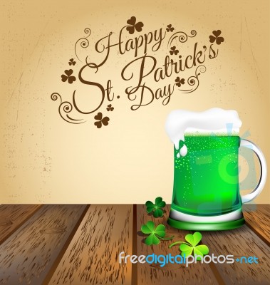 Green Beer With Shamrock On Wooden Floor Stock Image